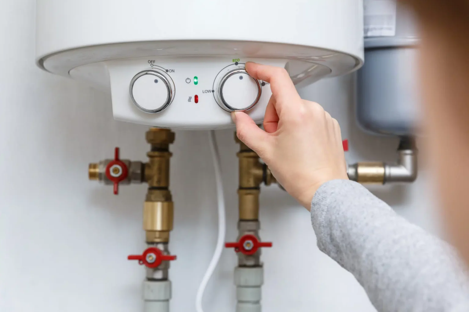 Technician adjusting a water heater in Los Angeles